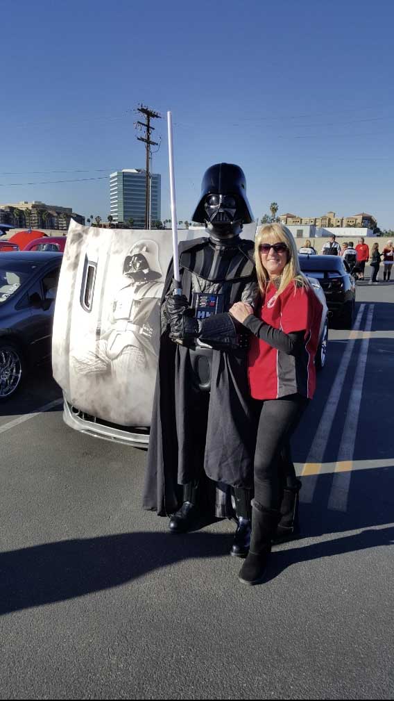 Standing beside a Star Wars Character at a Just Believe Foundation event